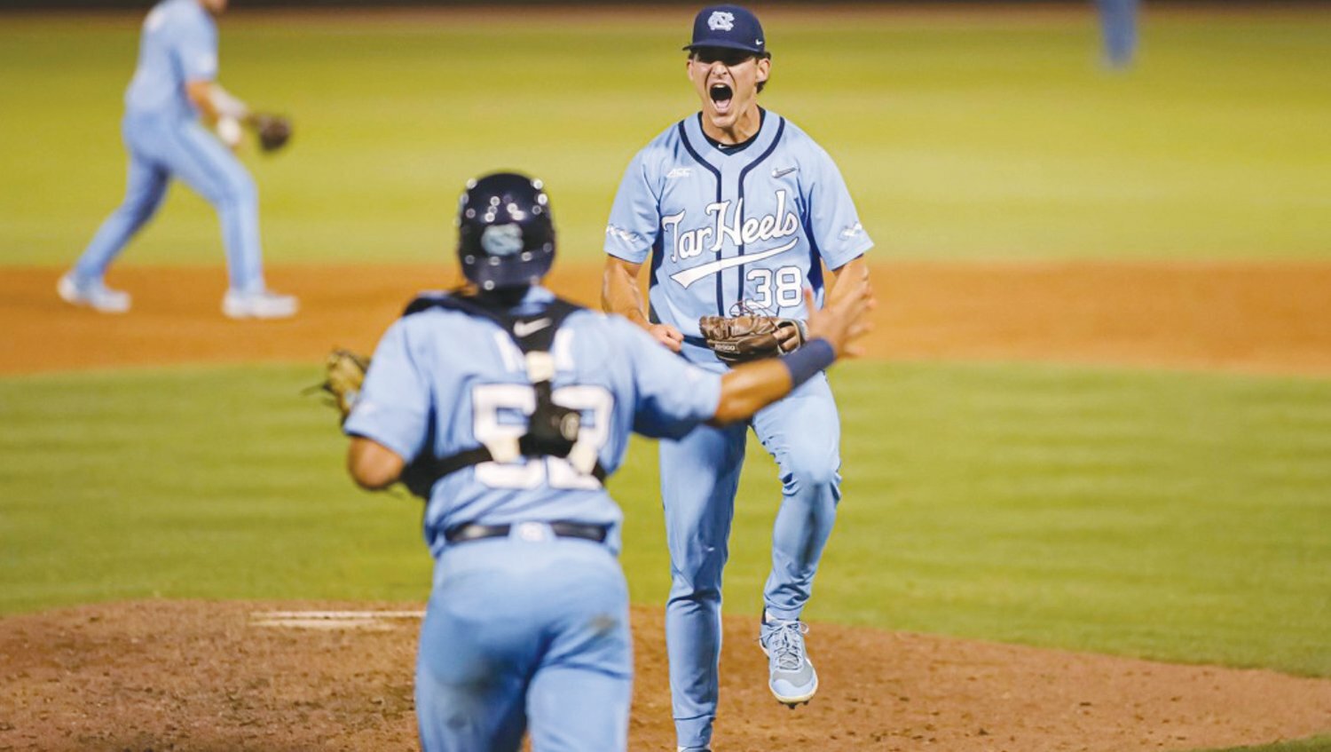 UNC relief pitcher Davis Palermo (38) lets out an emotional celebration after closing out the Tar Heels' 7-3 win over VCU in the NCAA Chapel Hill Regional on June 6, 2022, to advance to the Super Regional.